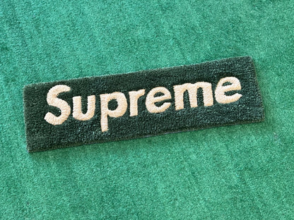 Green “Supreme” Rug